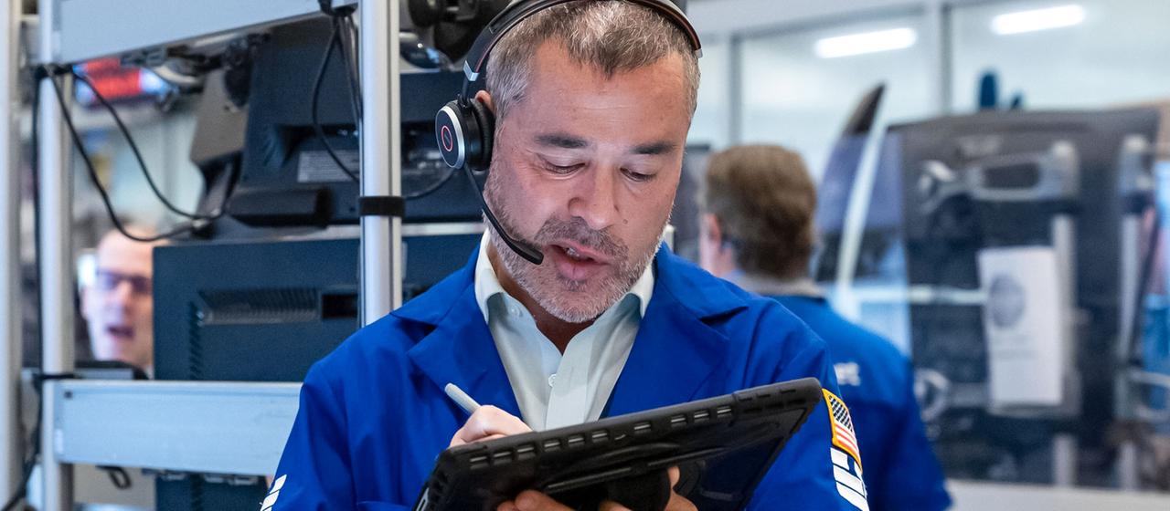 Stock market traders on the floor of the New York Stock Exchange.