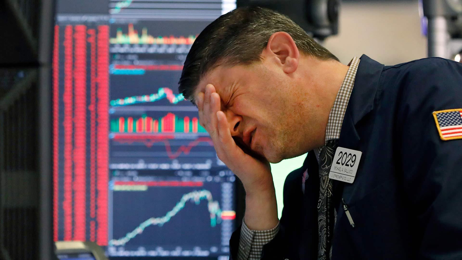 Händler an der New Yorker Börse. | picture alliance / ASSOCIATED PR