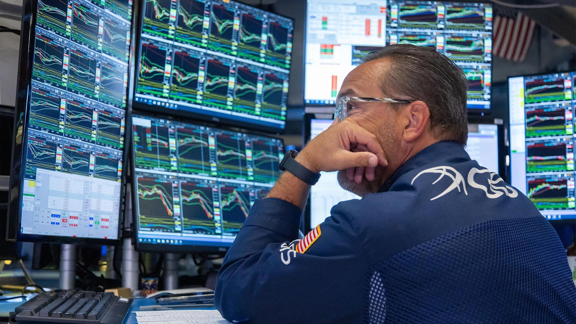 Händler an der New York Stock Exchange. | picture alliance / Xinhua News A