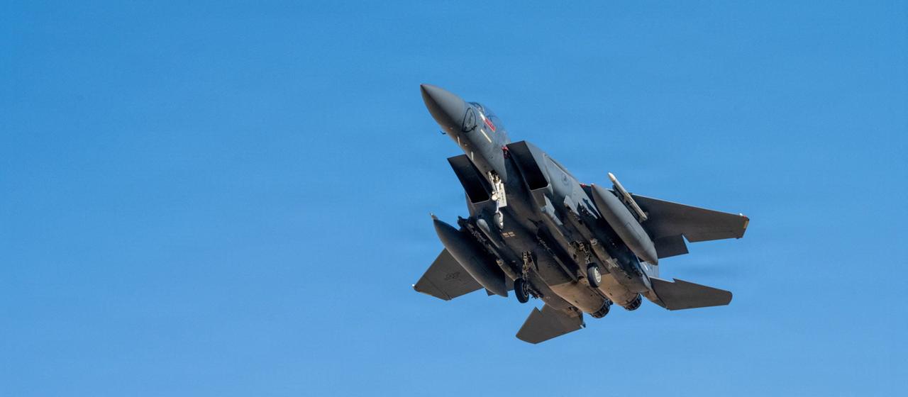 An F-15E fighter jet in the sky