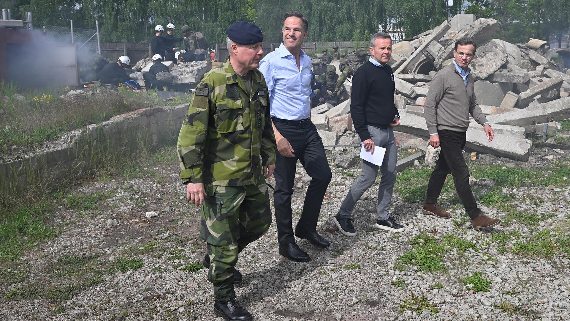 Carl-Johan Edstrom (L), Mark Rutte (2-L), Mikael Frisell (2-R) und Ulf Kristersson | EPA
