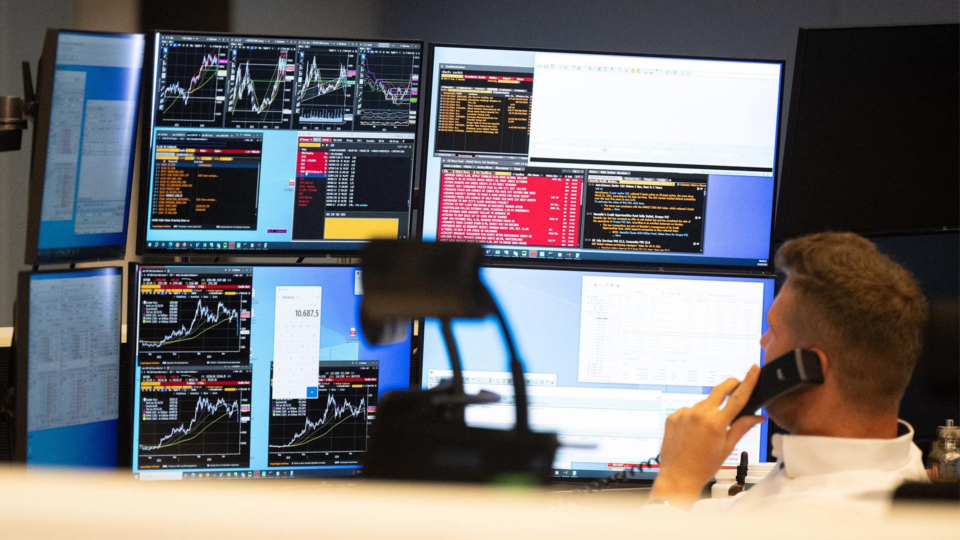 Händler an der Frankfurter Börse. | picture alliance/dpa
