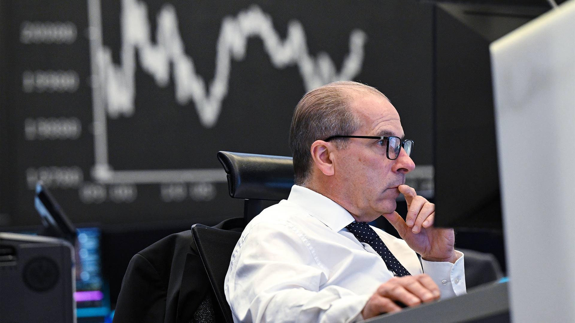 Börsenhändler an der Frankfurter Börse. | picture alliance/dpa