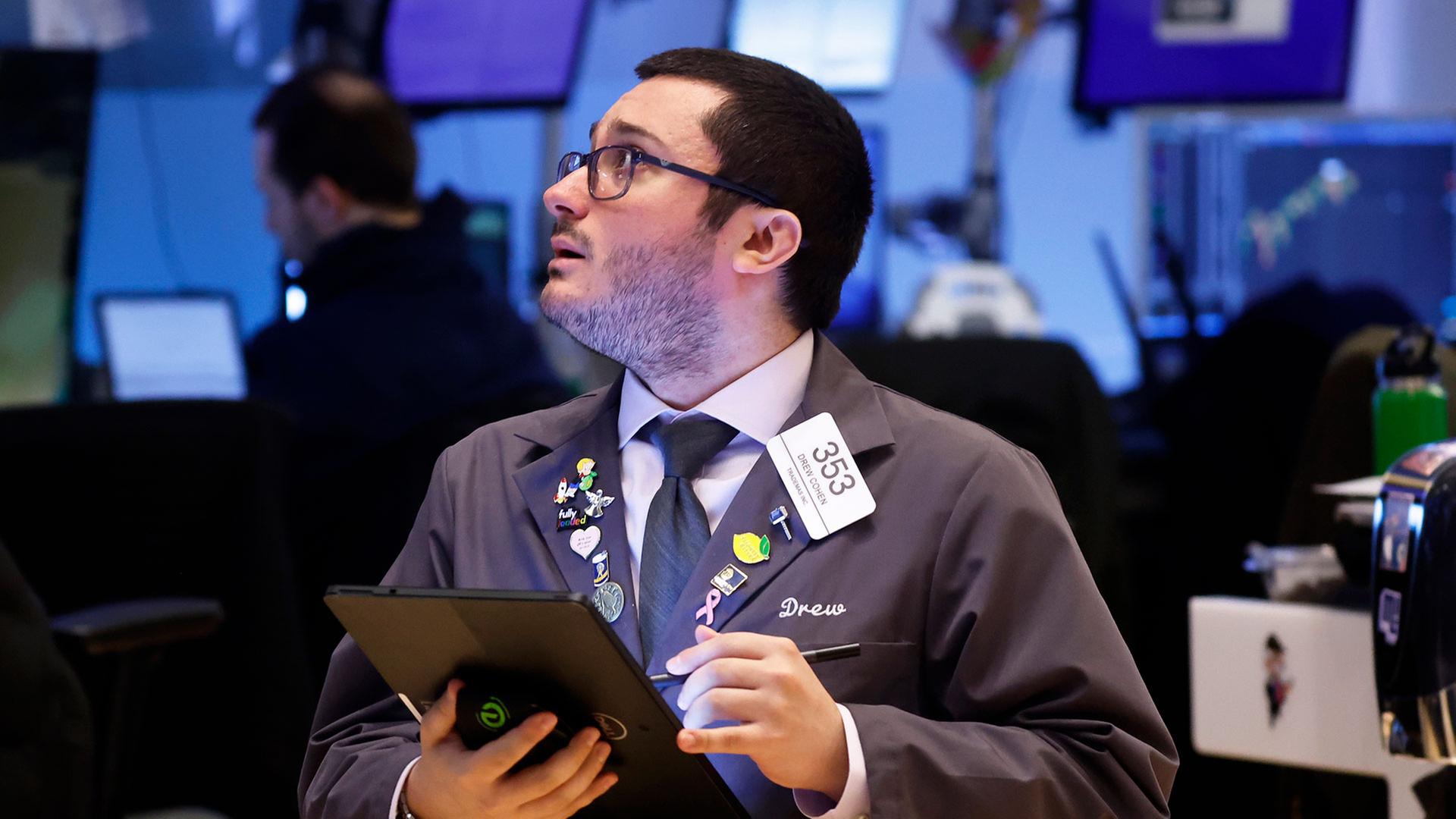 H�ndler an der New York Stock Exchange | picture alliance / Xinhua News A