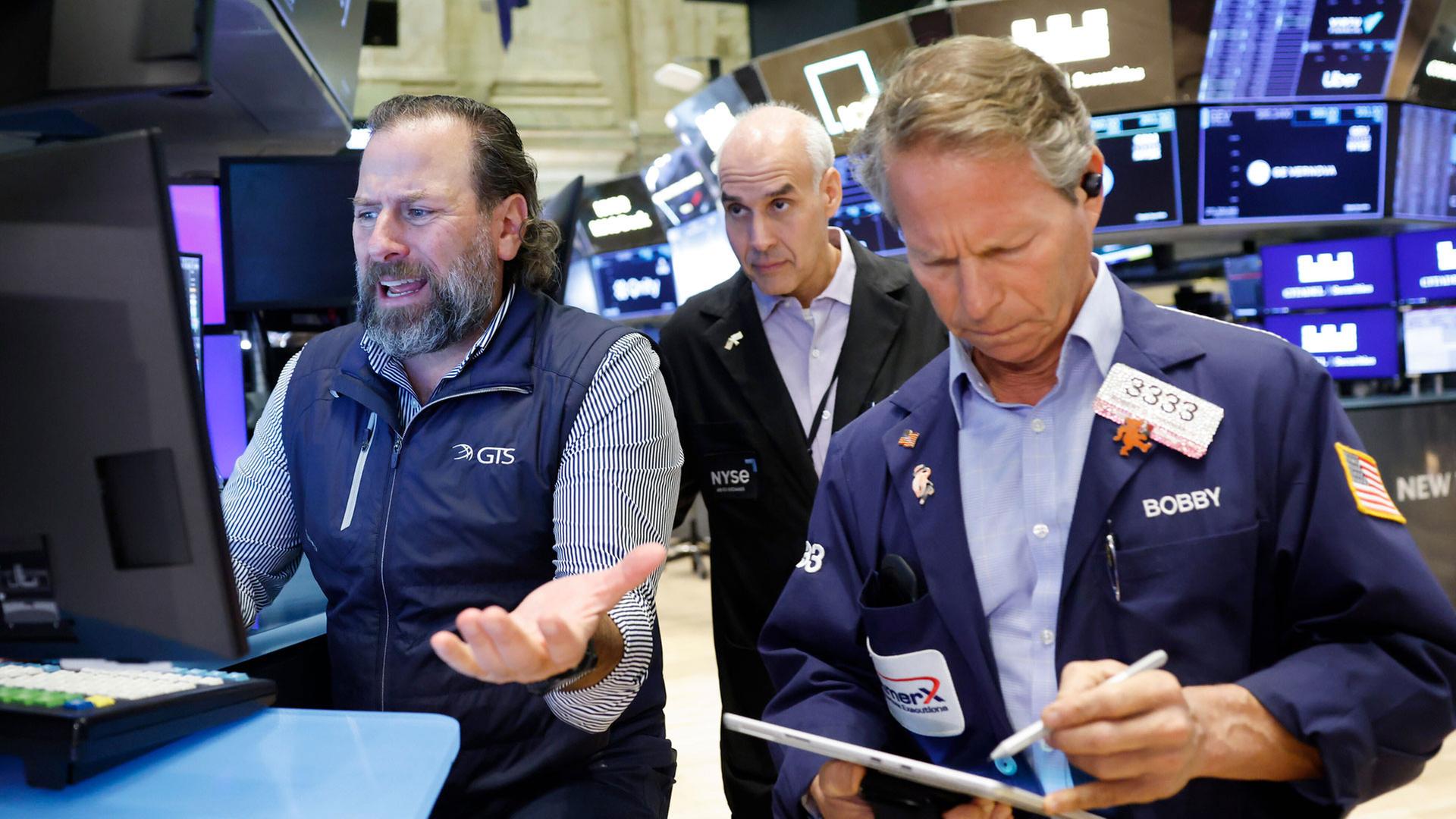 Händler an der New Yorker Börse. | picture alliance / newscom