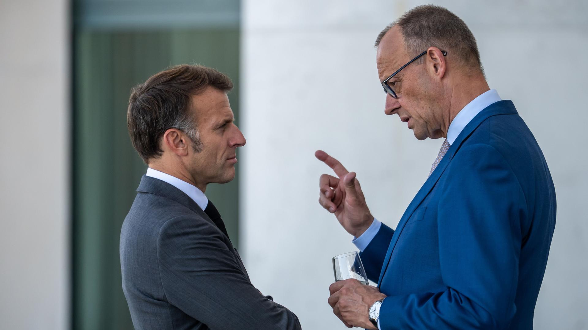 Emmanuel Macron und Friedrich Merz | Michael Kappeler/dpa pool/dpa