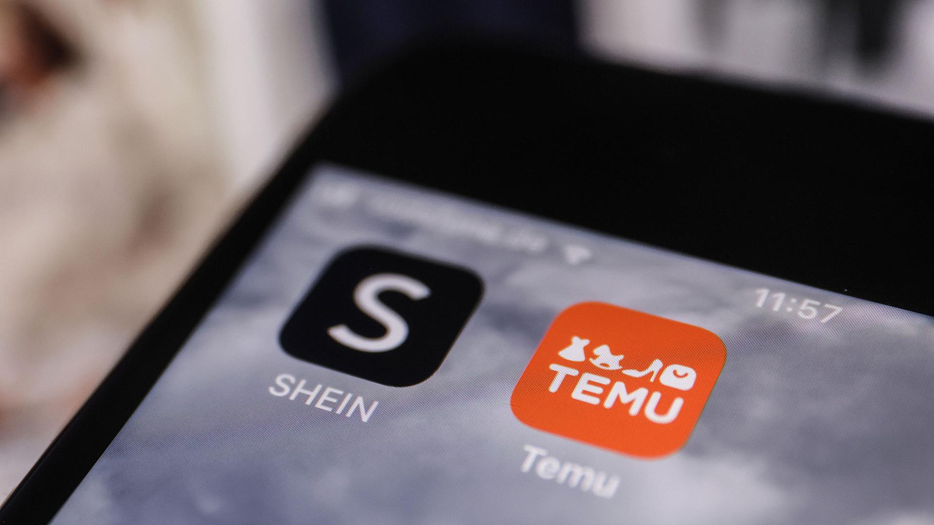 Die Apps der Interneth�ndler Temu und Shein sind auf dem Display eines Smartphones zu sehen. | dpa