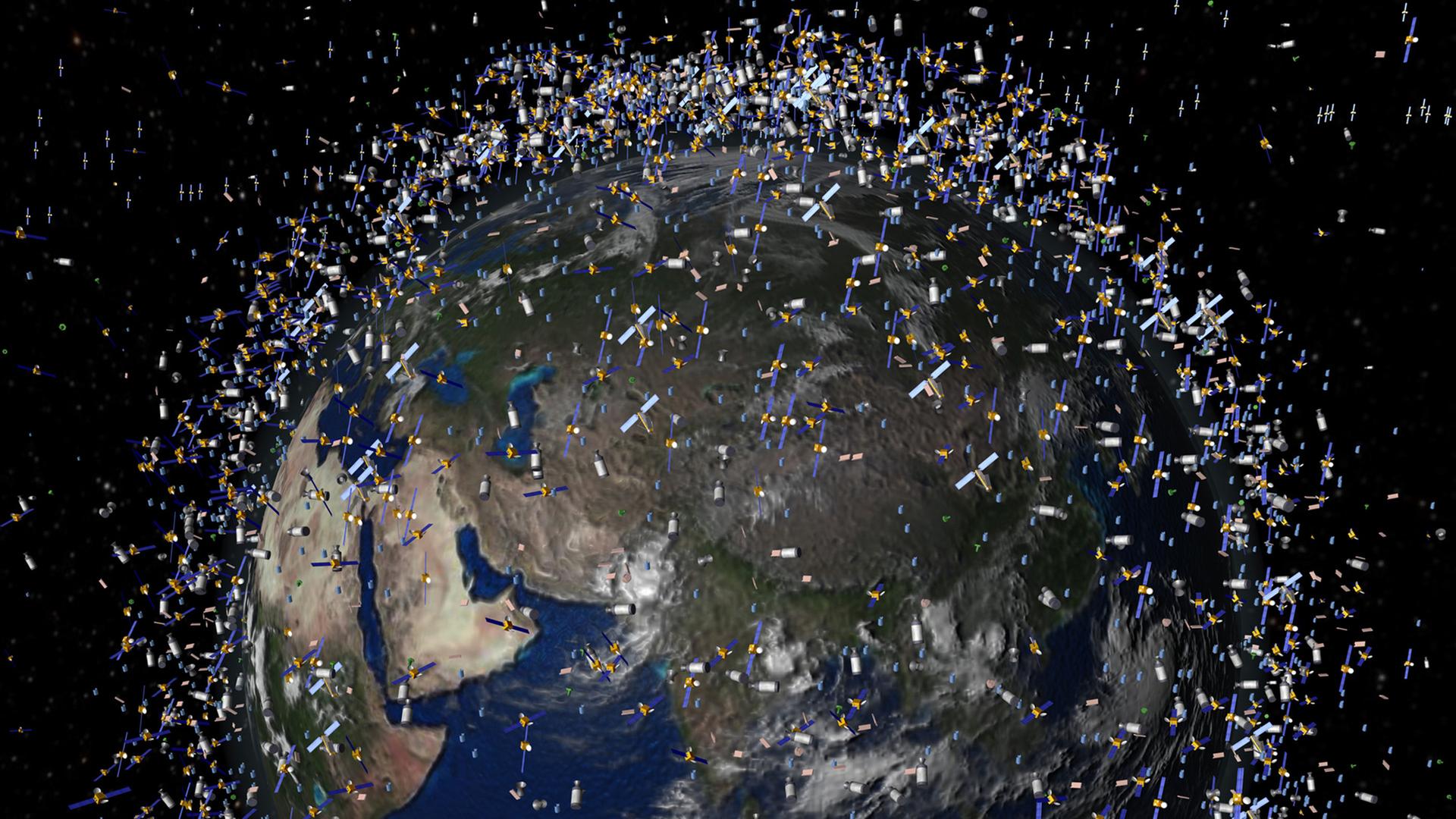Eine Illustration zeigt, wie Weltraumschrott um die Erde kreist. | ESA
