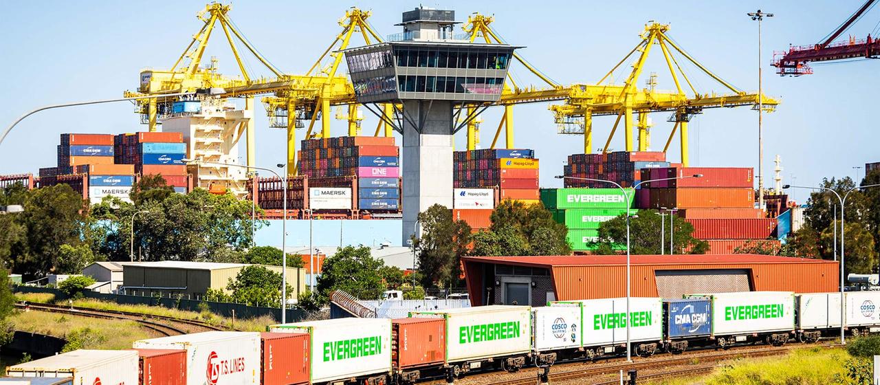Shipping containers and a freight train in Port Botany in Sydney.